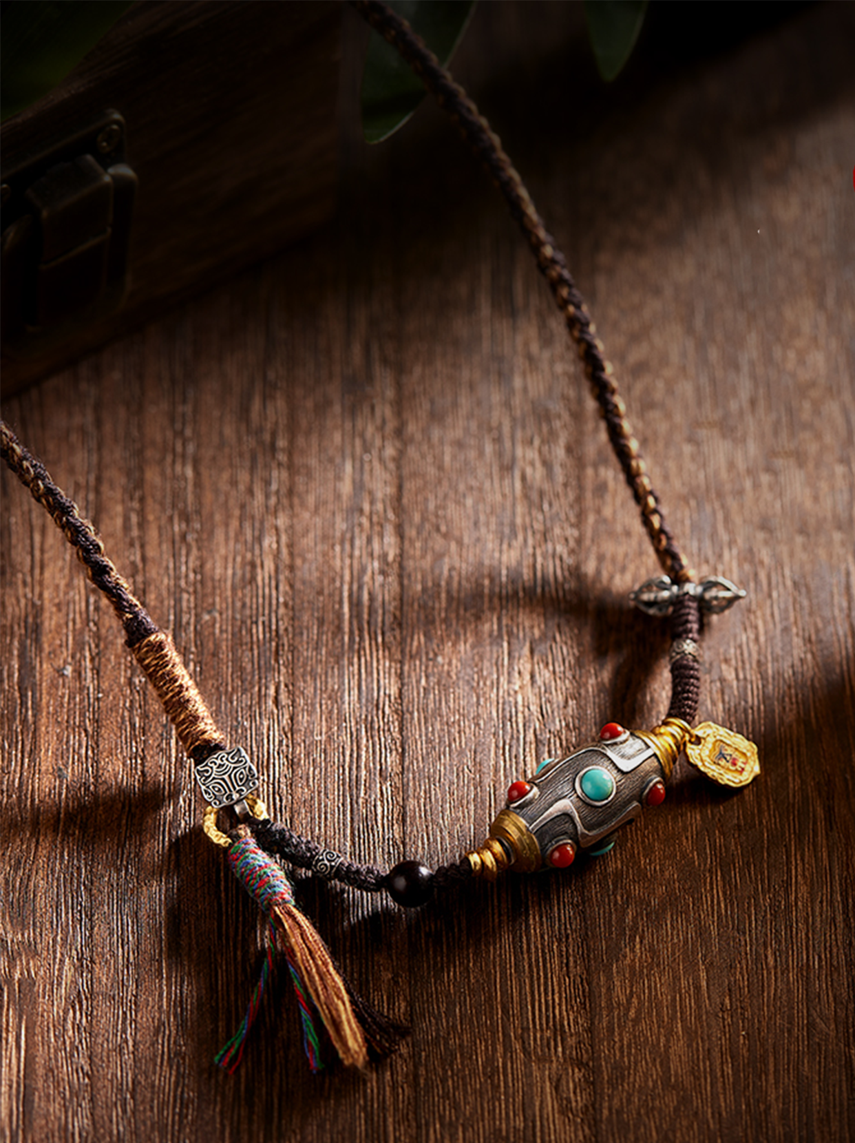 1_8b114e9a-6d82-4687-aaaa-2bafacfacc0c.png Handcrafted Woven Cord Nine-Eye Dzi Pendant - Image 1